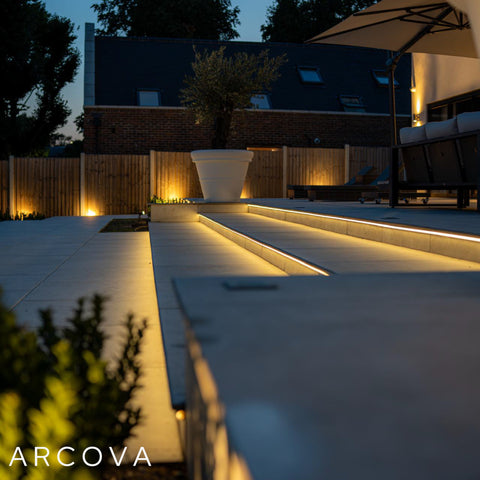 Aura SOB IP67 warm white LED strip lighting a garden pathway in Shenfield at night
